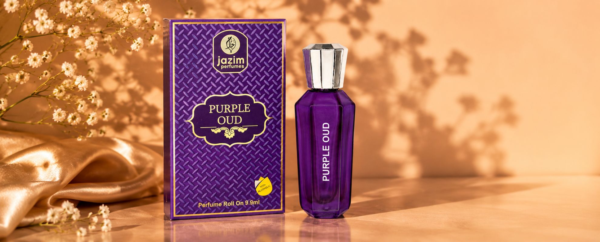 Jazim Perfumes Purple Oud non alcoholic perfume roll on bottle and box luxury website banner with warm beige satin background