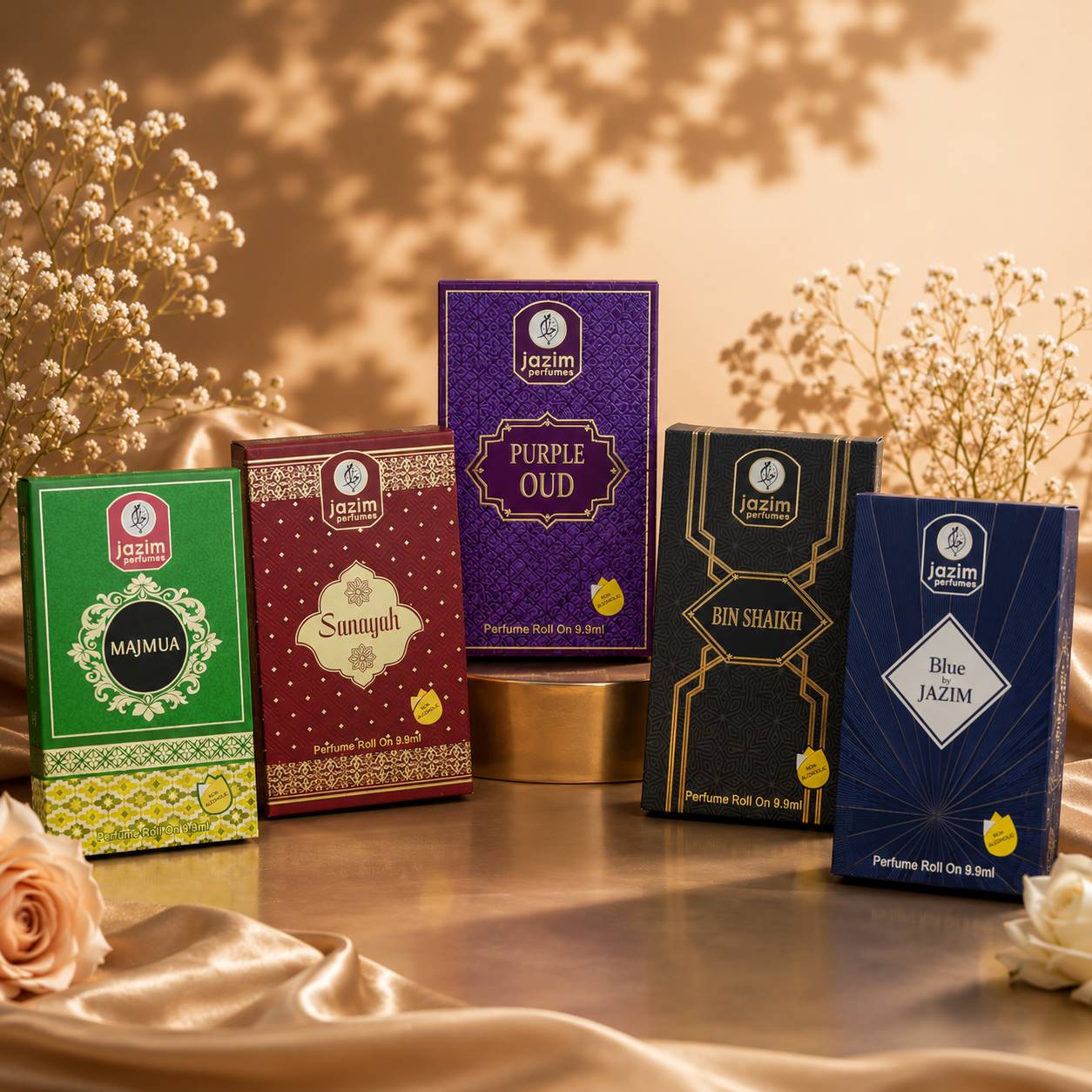 Premium Jazim Perfumes attar collection by Jazim perfume roll-on boxes arranged in a luxurious floral studio setting with satin fabric and warm golden lighting